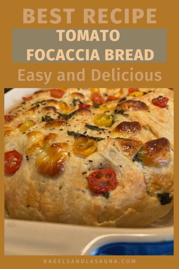 Close-up of an Easy Tomato Focaccia Bread with visible herbs and cherry tomatoes, accompanied by the text "Best Recipe Tomato Focaccia Bread Easy and Delicious.