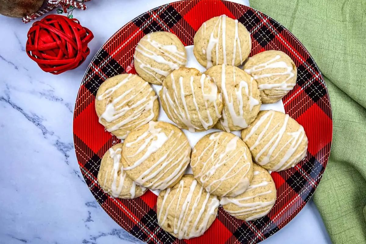 A plate of eggnog cookies with with spiced rum glaze on top.