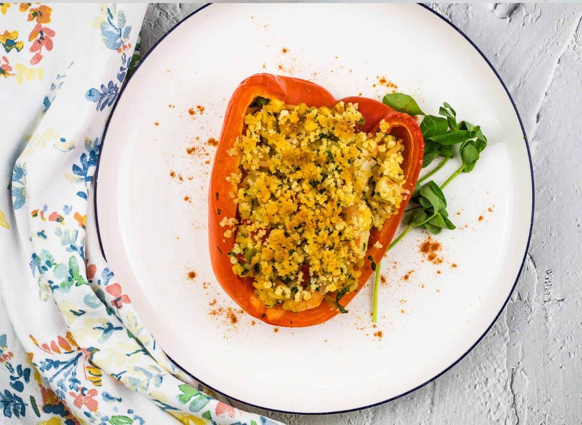 Seafood Stuffed Bell Peppers on a white plate.