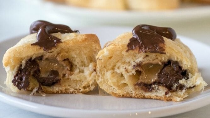 Peanut butter chocolate rolls cut open to show the filling.
