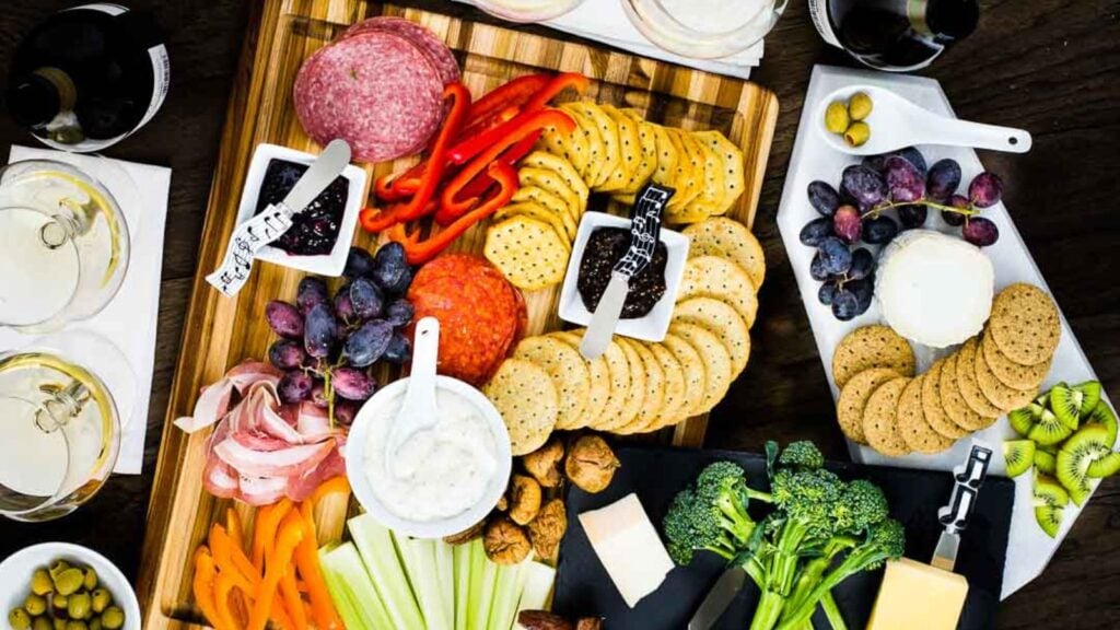 Overhead shot of charcuterie and cheese grazing board.
