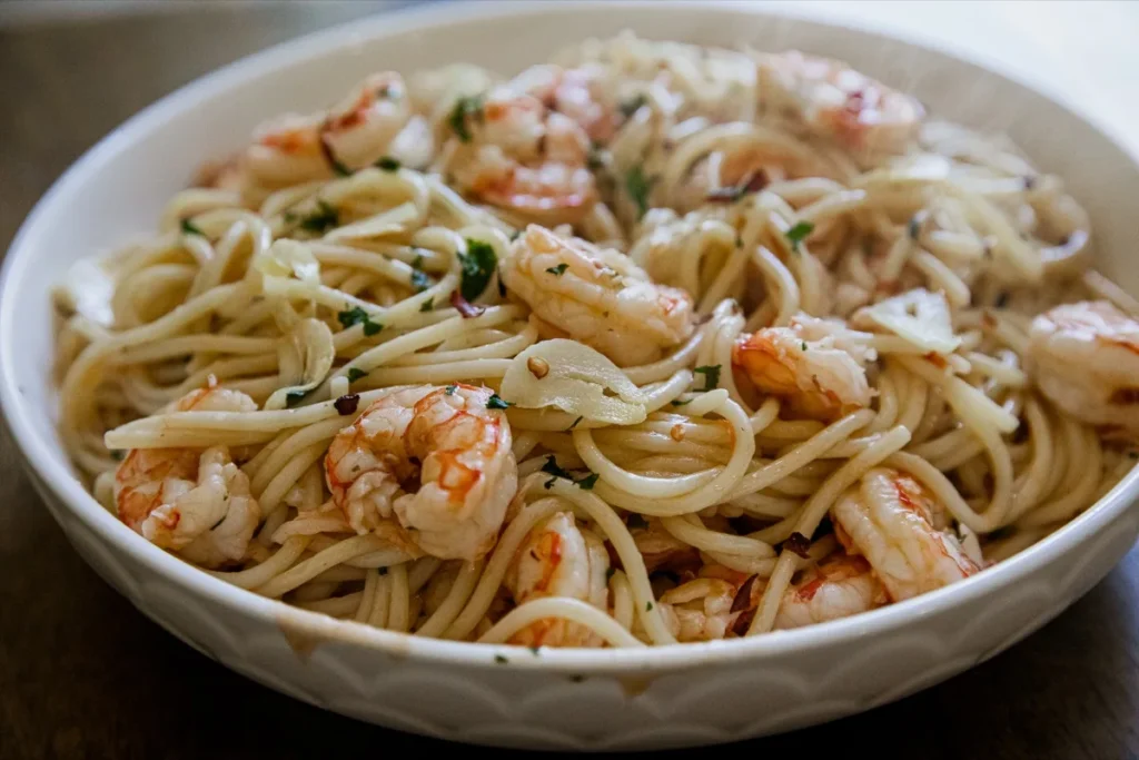 Spaghetti Aglio e Olio in a white bowl.